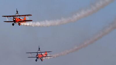 The wingwalkers perform at the Dubai Airshow. AFP