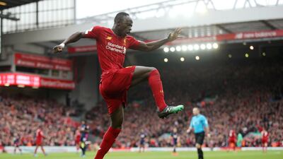 Liverpool's Sadio Mane celebrates scoring their second goal in the 2-1 win over Bournemouth, one of the last round of Premier League games at the beginning of March. To see the other matches that weekend, swipe the picture. Reuters