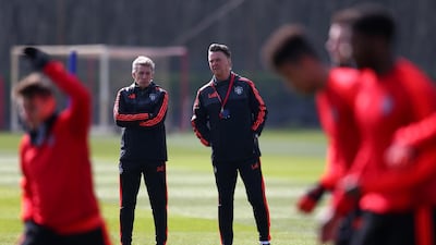 Louis van Gaal Manager of Manchester United watches training alongside Jos van Dijk, Coach of Manchester United during a training session ahead of the UEFA Europa League round of 16 second leg. Getty