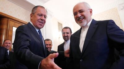 Russian Foreign Minister Sergei Lavrov (L) invites his Iranian counterpart Mohammad Javad Zarif (R) to have a seat during their meeting in Moscow, Russia, 14 May 2018. Reprosts state that the Iranian Foreign Minister is on a working visit to Moscow. EPA/MAXIM SHEMETOV / POOL