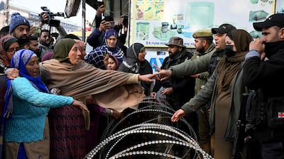 Relatives of the victims who died in an accidental blast at Nowgam Police Station await the release of bodies of the deceased. AFP