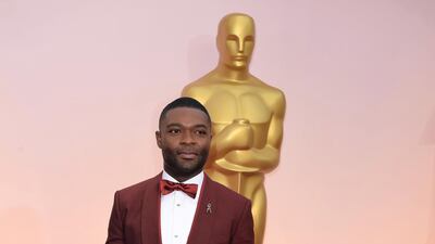 2015: David Oyelowo wears rich, red Dolce and Gabbana at the 87th Annual Academy Awards on February 22, 2015. AFP