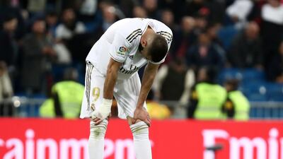 Real Madrid's Karim Benzema looks dejected after the match. Reuters