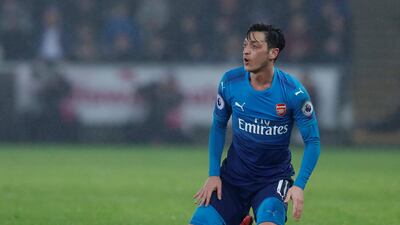 Mesut Ozil has signed an extension that is likely to see him stay at Arsenal until 2021. Andrew Couldridge / Reuters