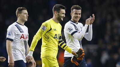 Tottenham Hotspur players Kevin Wimmer, Hugo Lloris and Dele Alli celebrate after their Premier League win over Watford on Saturday. Andrew Coulridge / Action Images / Reuters / February 6, 2016
