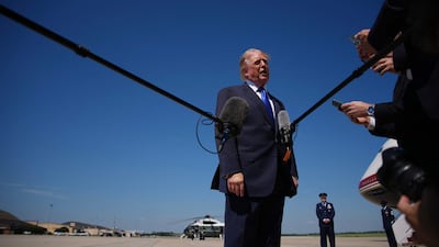 US President Donald Trump before boarding Air Force One on his way to Dallas, Texas, to attend the Republican National Convention. AFP
