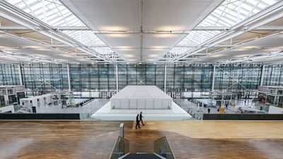 An empty departures hall at Munich International Airport. Bloomberg