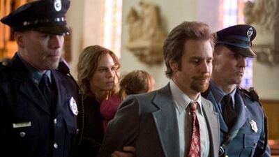 Hilary Swank and Sam Rockwell in Conviction.
