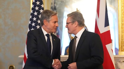 Mr Starmer greets United States Secretary of State Antony Blinken during a bilateral meeting in September in London