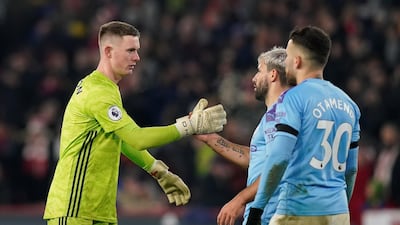 Sheffield United's Dean Henderson shakes hands with Sergio Aguero after the match. Reuters