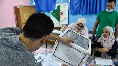 Algerian elections staff count ballots for parliamentary elections at a polling station in Bouchaoui, on the western outskirts of the capital Algiers. AFP