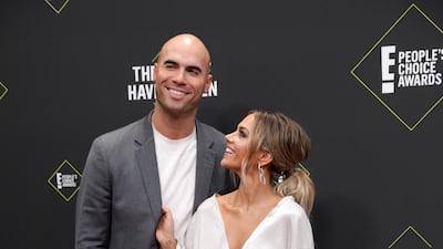 Jana Kramer and Mike Caussin arrive at the 2019 People's Choice Awards in Santa Monica, California, on Sunday, November 10, 2019. Reuters