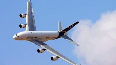 An Airbus A380 perfoms during the Dubai Airshow on November 18, 2013. Karim Sahib / AFP