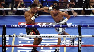 Jeo Santasima (left) and Emanuel Navarette during the World Boxing Organisation World Super Bantam Title bout at the MGM Grand, Las Vegas. PA wire