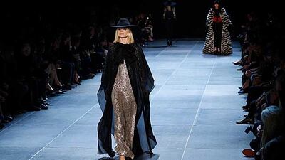 From Saint Laurent, there were many floating kaftan-like cover-ups – almost abayas – draped over the edgy silhouettes. Gonzalo Fuentes / Reuters