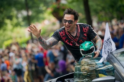 Jason David Frank makes his way down Peachtree Street in the annual DragonCon parade through downtown Atlanta, on August 31, 2013. Photo: Atlanta Journal-Constitution via AP, File