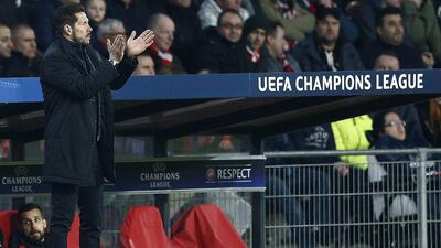 Atletico Madrid manager Diego Simeone observes his side during their Champions League last 16 first leg match against PSV Eindhoven in the Netherlands on Wednesday night. Peter Dejong / AP / February 24, 2016