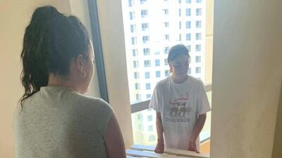The flatmates then carried the pallets out to the balcony to assemble their crate chair. Photo by Samantha Hall