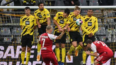 Freiburg midfielder Jonathan Schmid attempts a free-kick against Borussia Dortmund. AFP