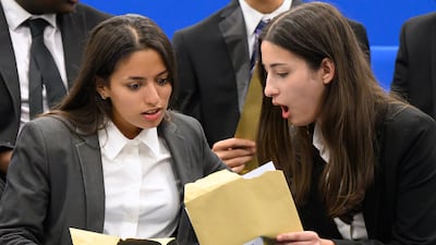Students Isabel Victor-Nesadurai and Cara Procopio receive their A-level results at the City of London Academy Highgate Hill, in London. Getty Images