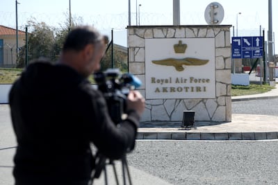 A member of the media outside RAF Akrotiri after an attack by an Iranian-made drone. Getty Images
