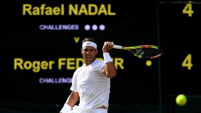 LONDON, ENGLAND - JULY 12: Rafael Nadal of Spain plays a forehand in his Men's Singles semi-final match against Roger Federer of Switzerland during Day eleven of The Championships - Wimbledon 2019 at All England Lawn Tennis and Croquet Club on July 12, 2019 in London, England. (Photo by Shaun Botterill/Getty Images)