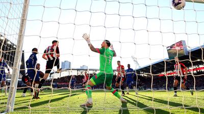 Axel Disasi of Chelsea scores his team's second goal past Mark Flekken of Brentford. Getty Images