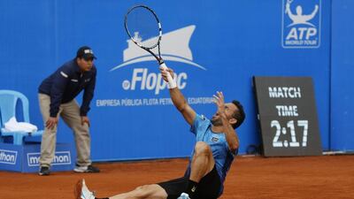 Victor Estrella from the Dominican Republic celebrates after defeating top seed Feliciano Lopez of Spain to win the ATP Ecuador Open on Sunday. Dolores Ochoa / AP / February 8, 2015