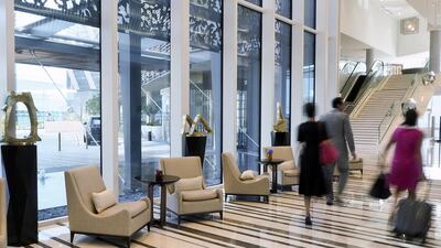 The Four Seasons Hotel lobby on Al Maryah Island in Abu Dhabi is home to seven bronze sculptures by Ashwaq Abdulla. Delores Johnson / The National