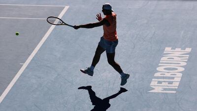 Rafael Nadal hits a forehand during a practice session at Melbourne Park. EPA
