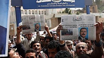 Regime supporters gathered in Sanaa on Friday to brandish copies of Al Thawra newspaper with Ali Abdullah Saleh on the cover.