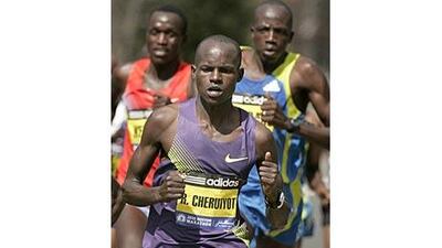Robert Cheruiyot won the Boston Marathon, ahead of Deroba Merga, left, in record time.