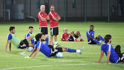 Alberto Zaccheroni, left in red shirt, put his UAE players through their paces during training ahead of their friendly against Haiti in Al Ain. Courtesy UAE FA