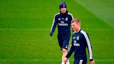 Real Madrid midfielders Luka Modric, background, and Toni Kroos. AFP