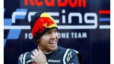 Sebastian Vettel, the world champion, has signed a new deal to stay with Red Bull until 2014. Jens Buettner / EPA