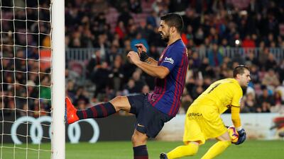 Luis Suarez kicks the post in frustration. Reuters