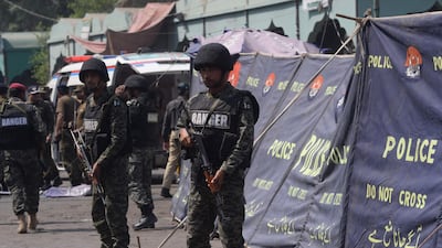 Soldiers cordon off the bombe site. AFP