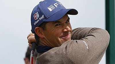 Padraig Harrington of Ireland watches his tee shot on the third tee during a practice round ahead of the British Open championship at the Turnberry Golf Club in Scotland.