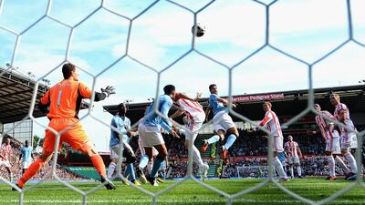 Javi Garcia of Manchester City scores the equalising goal during the squad's Premier League match against Stoke City at Britannia Stadium in Trent, England. Laurence Griffiths / Getty Images