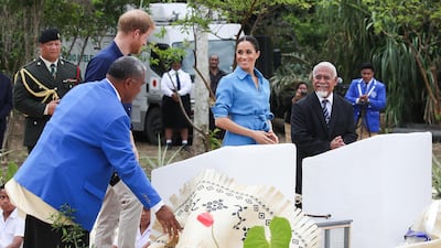 Prince Harry, Duke of Sussex and Meghan, Duchess of Sussex unveil The Queen's Commonwealth Canopy at Tupou College. Getty Images