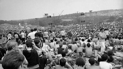 This August 14, 1969 photo shows some of the 400,000 concertgoers who attended the Woodstock Music and Arts Festival on a 600-acre pasture near Bethel, New York. AP