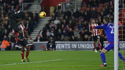Divock Origi of Liverpool heads in the sixth goal of his team’s 6-1 League Cup quarter-final win over Southampton on Wednesday night. Eddie Keogh / Reuters