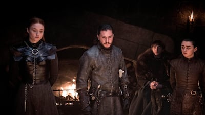 Sophie Turner, Kit Harington, Isaac Hempstead Wright and Maisie Williams in a scene from 'Game of Thrones.' Fans got a taste of the modern world when eagle-eyed viewers spotted a takeout coffee cup on the table during a celebration in which the actors drank from goblets and horns. Courtesy HBO
