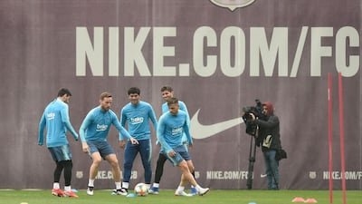Barcelona's players were kept busy in Friday's training session. AP Photo