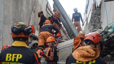 Responders at the scene. AFP