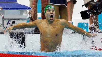 South Africa's Chad le Clos reacts as he wins gold in the men's 200-meter butterfly swimming final at the Aquatics Centre. Michael Sohn/AP