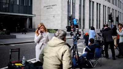 Members of the media gather outside St Bartholomew's Hospital, where Prince Philip has been transferred. AFP