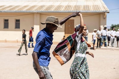 South Africans perform a traditional dance in the town of Sanddrift, where residents successfully reclaimed their ancestral land from a state-owned mining company. AFP