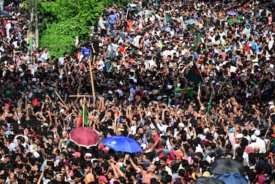 Anti-government protestors celebrate in Shahbag near Dhaka University. AFP