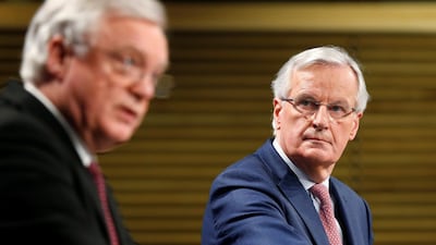 Britain's Secretary of State for Exiting the European Union David Davis and European Union's chief Brexit negotiator Michel Barnier address a joint news conference in Brussels, Belgium March 19, 2018. REUTERS